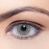 Solotica Hidrocor Cristal colored contact lenses with a bright grey color."