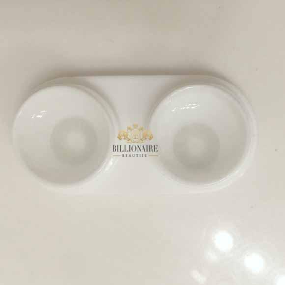 Solotica Hidrocor Quartzo bright blue-green contact lenses with a natural, high-opacity finish for dark eyes.