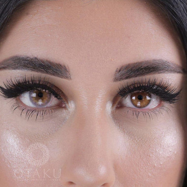 Best unicorn-inspired purple contact lenses for dark eyes, offering high opacity and a soft rainbow glow.