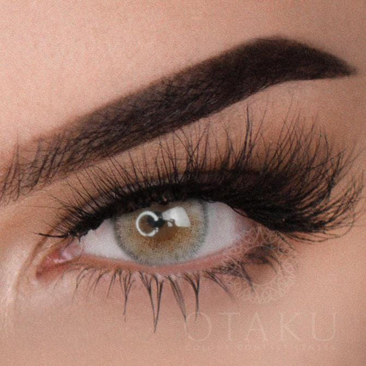 Dark Silver contact lenses with a bold limbal ring, designed for dark eye coverage and a striking silver-grey finish.
