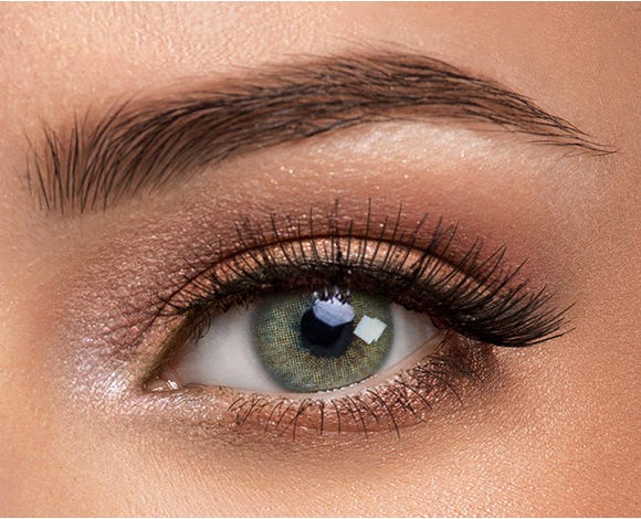 Earthy jade green colored contact lenses with yellow and brown undertones, inspired by the jade gemstone