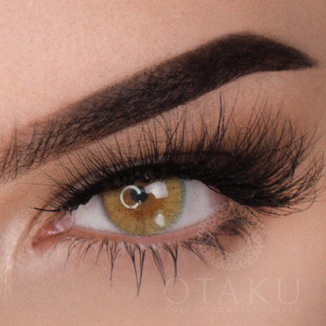 Before and after transformation with Kryptonite Green Otaku colored contact lenses on dark brown eyes."