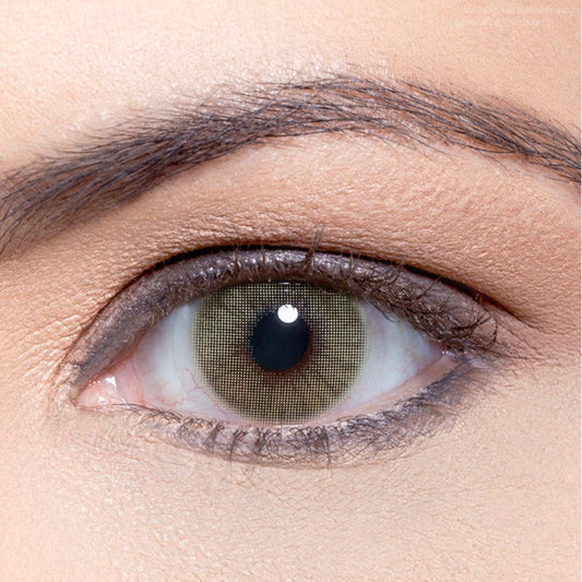 Solotica Hidrocor Mel colored contact lenses with a natural green-hazel blend