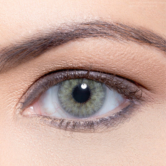 Solotica Hidrocor Quartzo colored contact lenses with a bright blue-green finish