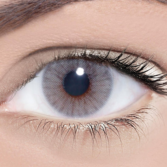 Solotica Hidrocor Rio Parati grey-blue contact lenses with no limbal ring, designed for full dark eye coverage and a soft, natural finish