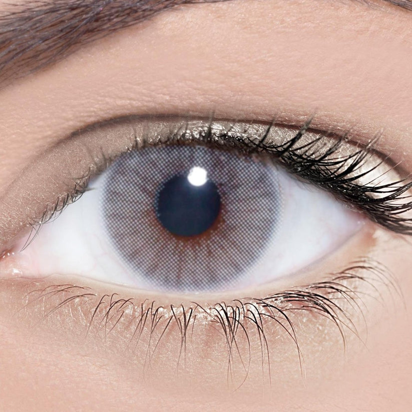 Solotica Hidrocor Rio Parati grey-blue contact lenses with no limbal ring, designed for full dark eye coverage and a soft, natural finish